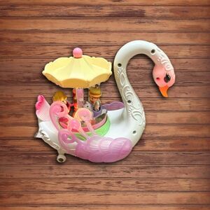 Swan Carousel Toy with Pink and Yellow Accents